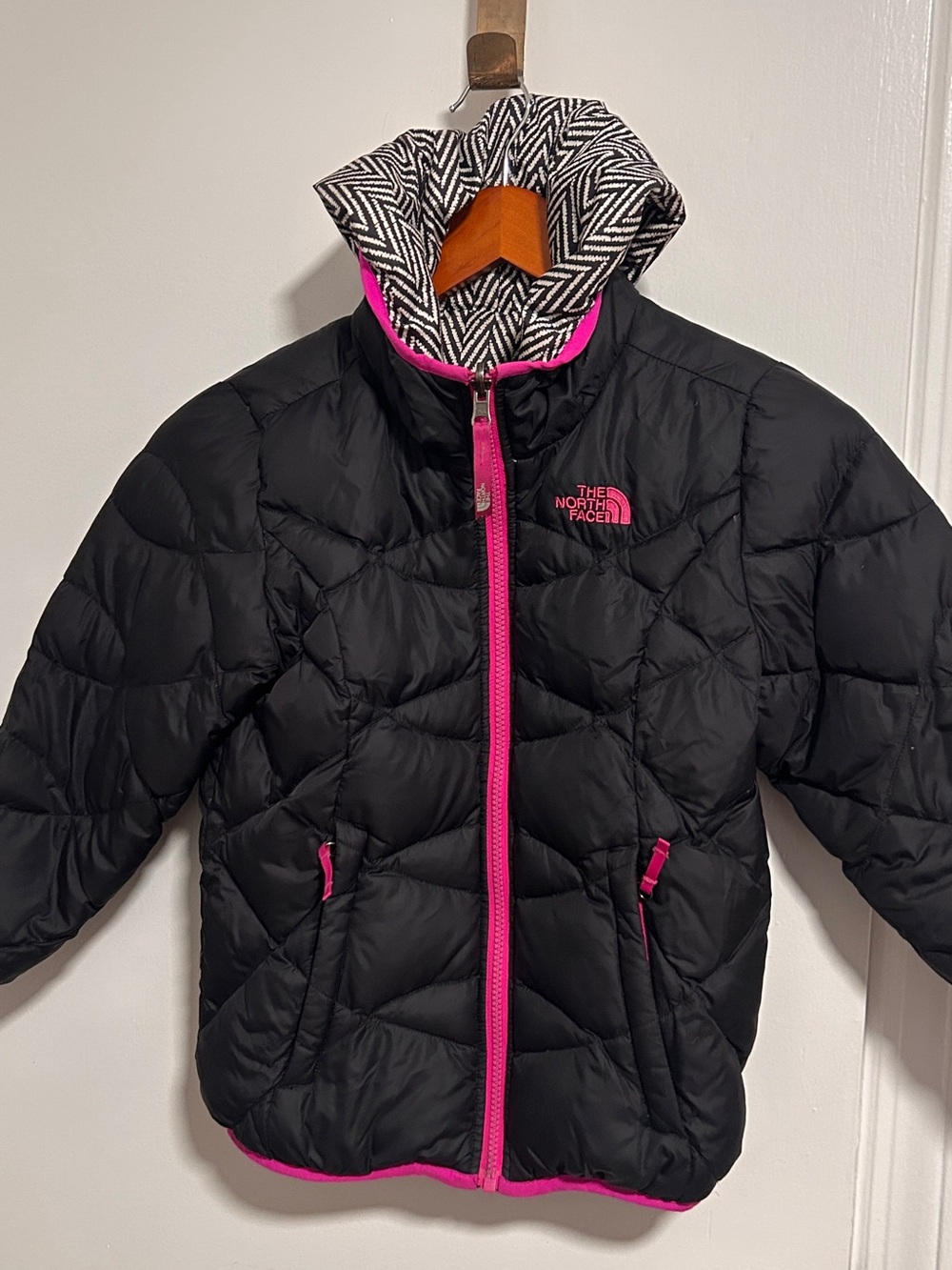 The North Face Black Puffer Jacket with Hot Pink Trim reversible herring bone